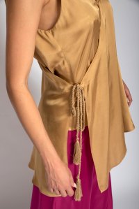 Satin asymetric top with handmade knitted details gold