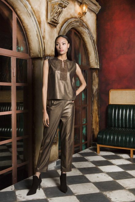 Faux leather trousers with side knitted details bronze metallic