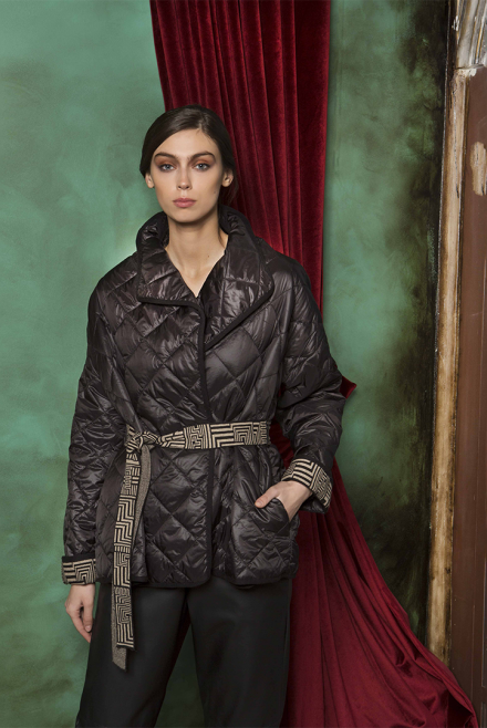 Quilted coat with knitted details black