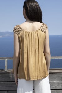Satin top with handmade knitted details gold
