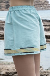 Embroidered jaquard shorts with knitted details teal-gold-black