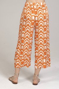 Σατέν εμπριμέ παντελόνι με πλεκτές λεπτομέρειες orange-ivory-gold